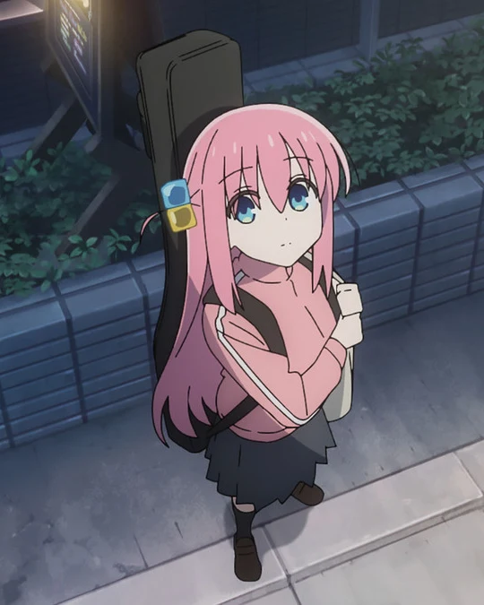 Hitori looks up from a pavement with a guitar case on her back.