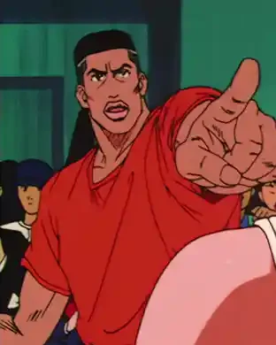 Akagi gestures towards Hanamichi inside the basketball gym.