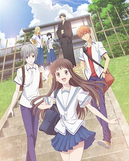 Tohru and members of the Sohma family gather on and around a staircase.