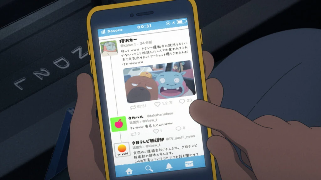 A hand holds a phone showing a social-media post with a photograph of the taxi driver and passenger.