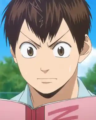 Eiichiro studies a pink notebook beside the tennis courts.