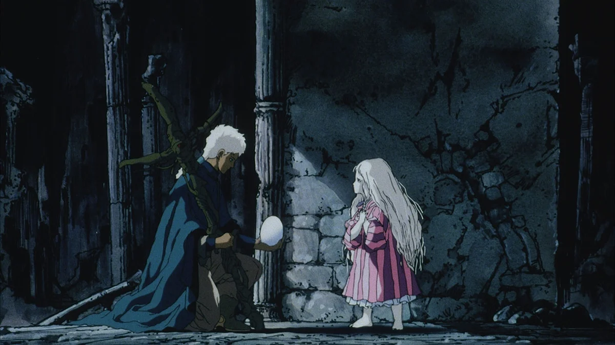 The boy kneels holding an egg towards the girl beside a dark stone doorway, his cross-shaped weapon across his shoulder.