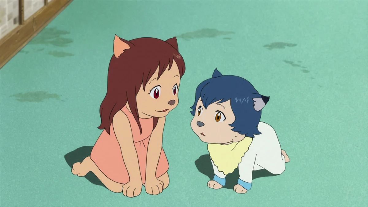 Young Yuki and Ame crouch together indoors, each with wolf ears visible above their hair.