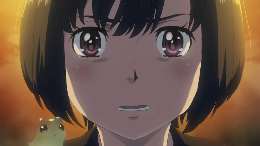 A dark-haired girl looks ahead with tears gathering under her eyes; a small yellow creature is beside her.