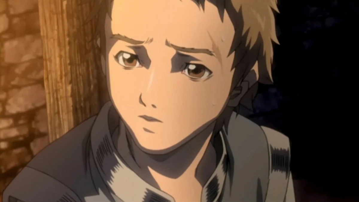 A worried short-haired boy looks to one side beside a rough wooden doorway.