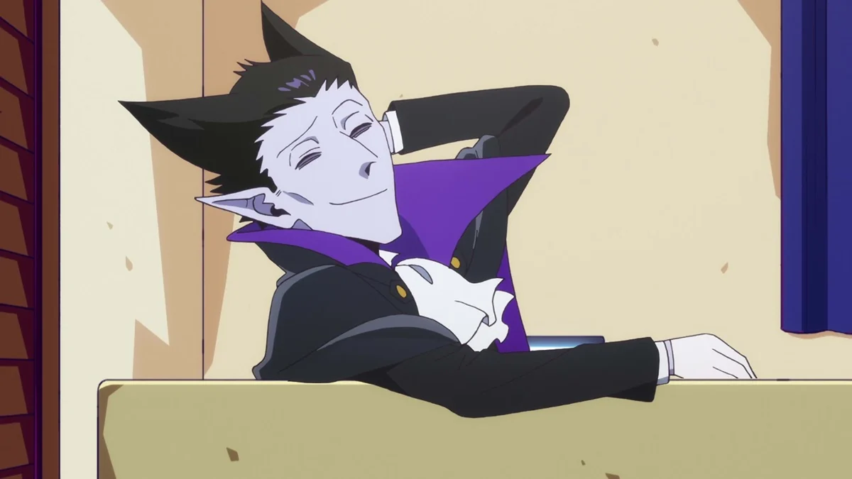 A pale, pointed-eared vampire in a black suit and purple-lined cape reclines with one hand behind his head.