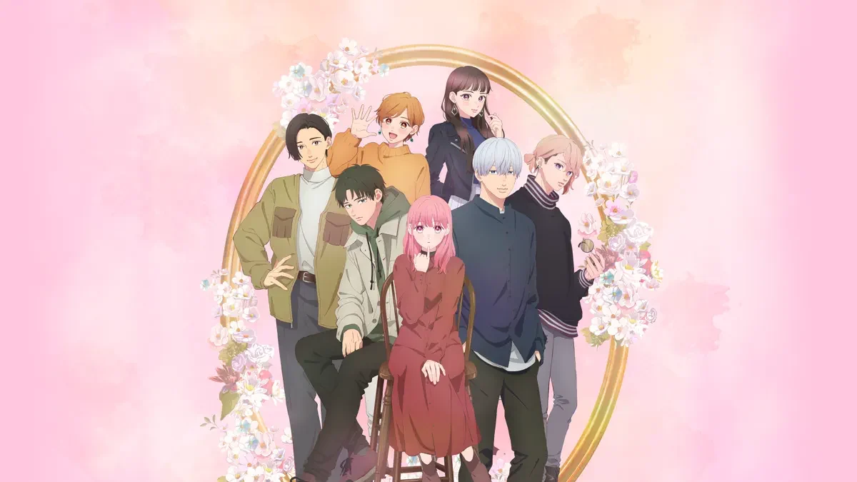 Yuki and Itsuomi stand in front of a larger group within a floral circular frame.
