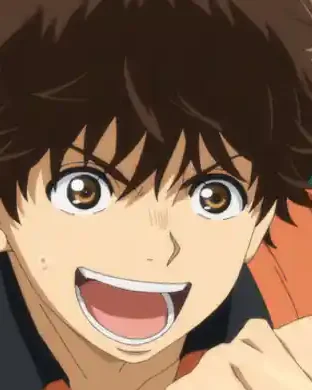Ashito, wearing an orange training bib, runs with his mouth open.