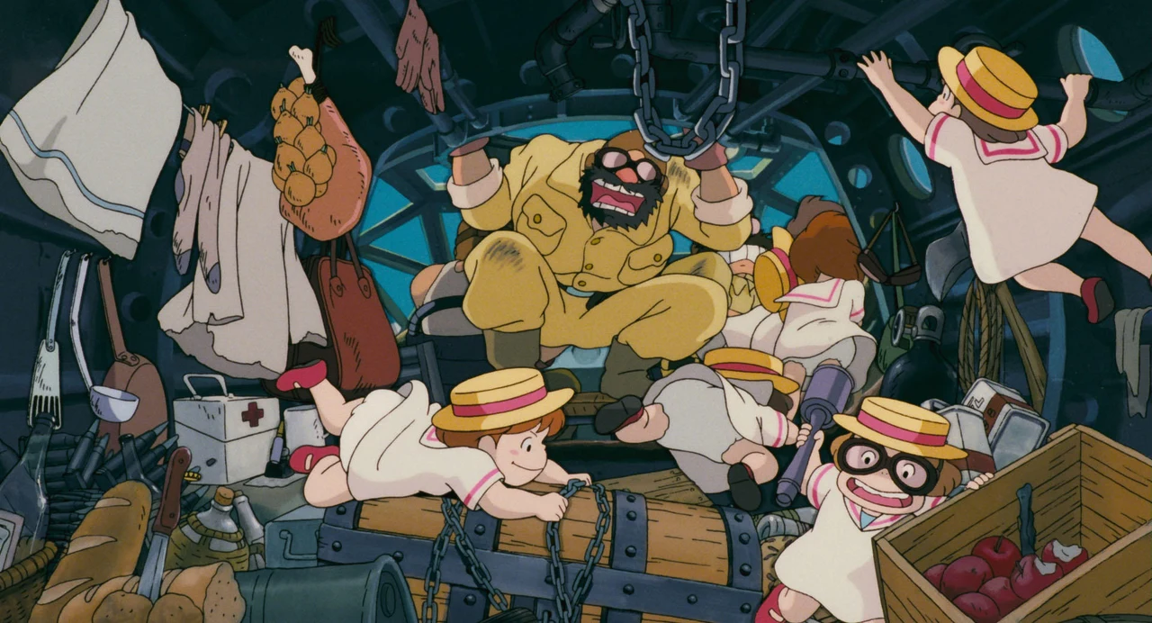 Children crowd around a large pirate in a cluttered aircraft cabin.
