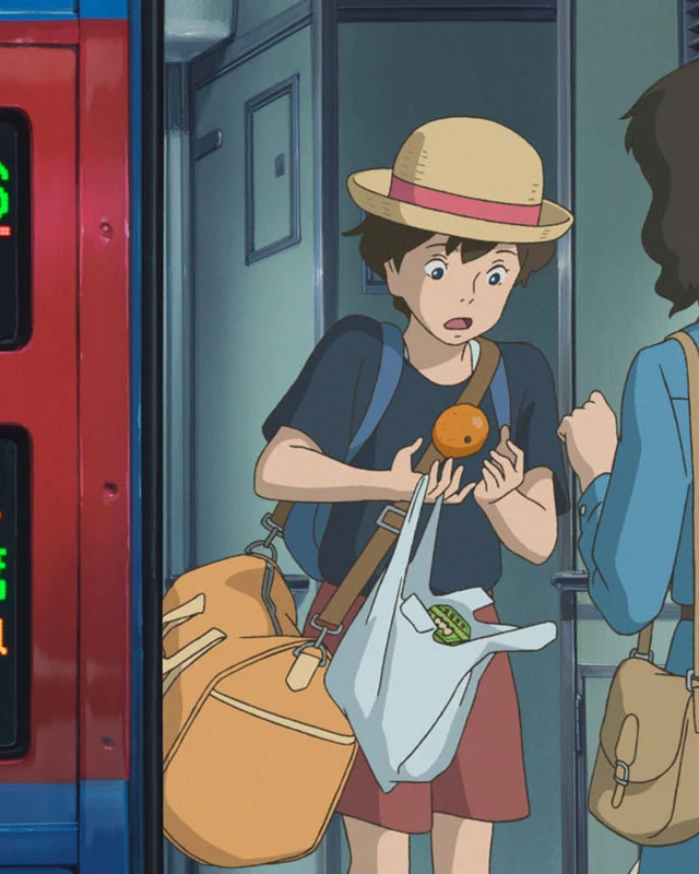 Anna stands at a train doorway with an orange and her luggage.