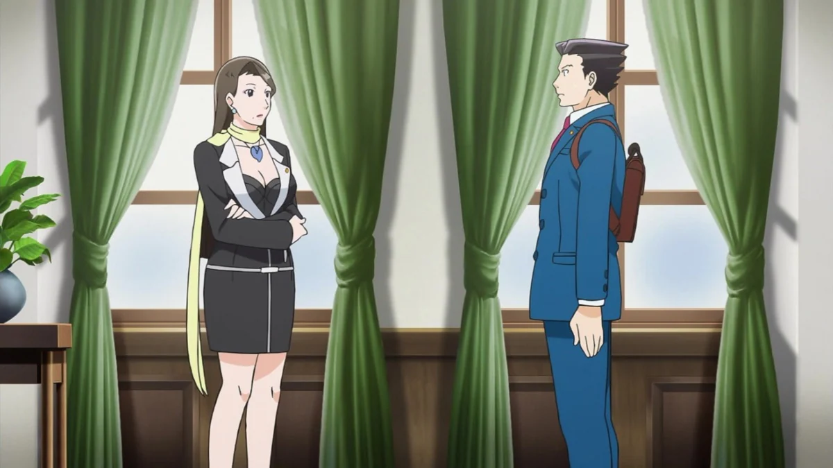 Mia Fey and Phoenix Wright speak indoors.