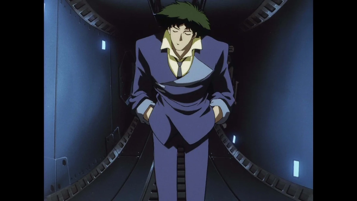 Spike stands alone inside a curved metal passage.
