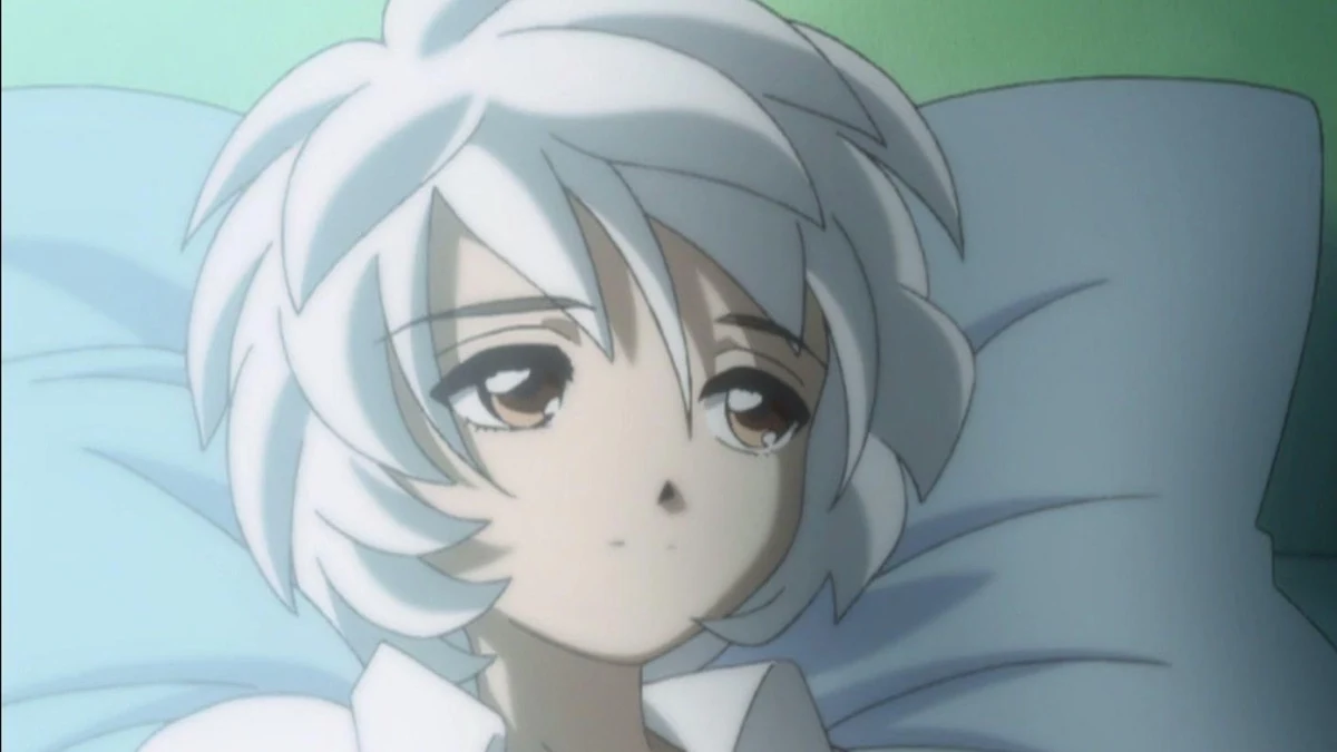 The silver-haired Mytho lies against a pale pillow.