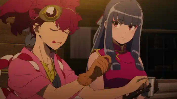Appare, in goggles and a red-and-white outfit, stands beside Xialian in pink.
