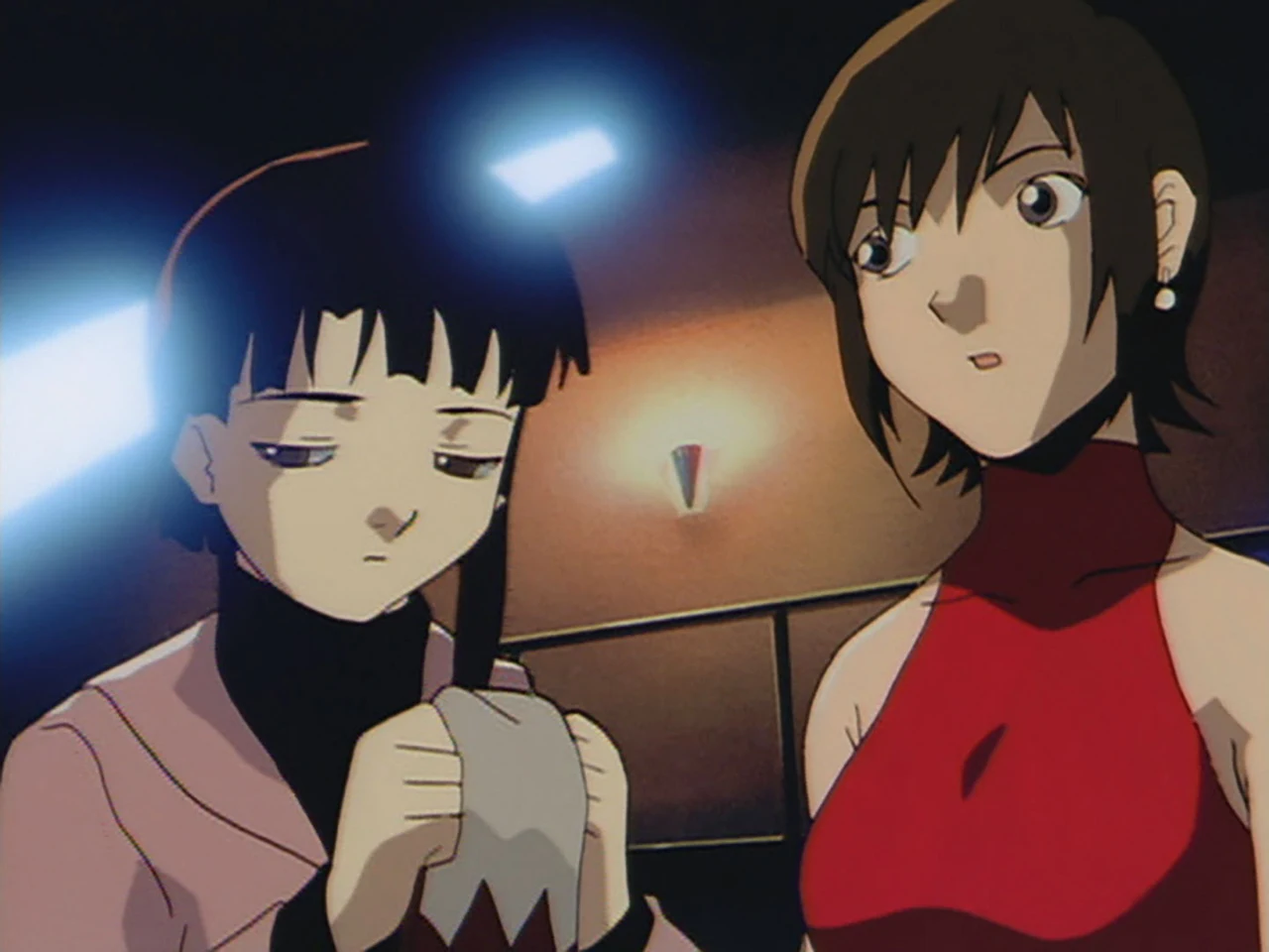 Lain and a friend stand together beneath the lights of the Cyberia club.