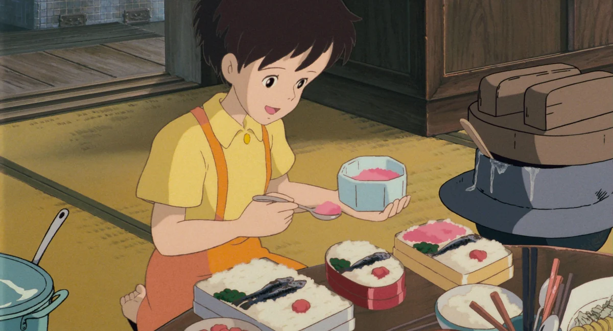 Satsuki spoons pink topping onto rice in a row of packed lunches beside a cooking pot.
