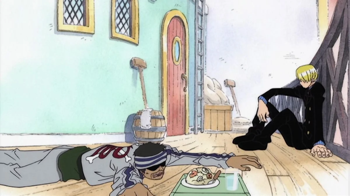 Gin lies on the restaurant deck beside a plate of food while Sanji sits against the wall nearby.