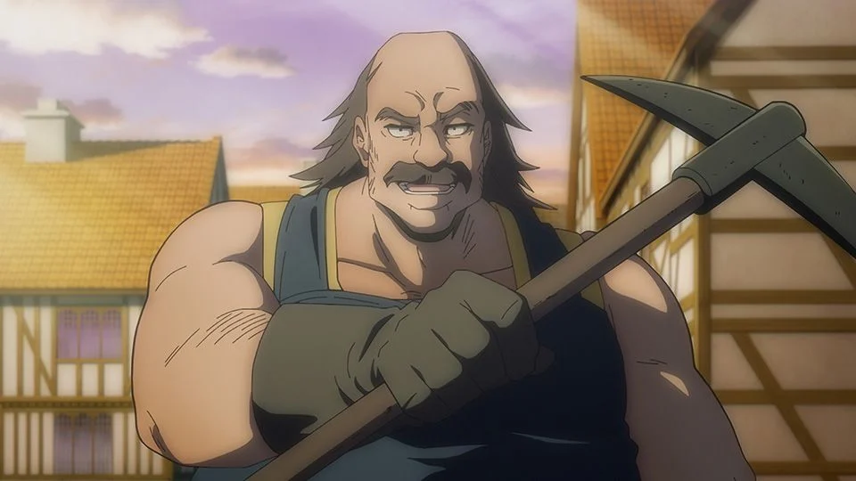 Smith stands outside his workshop in an apron, holding a large hammer across his chest.