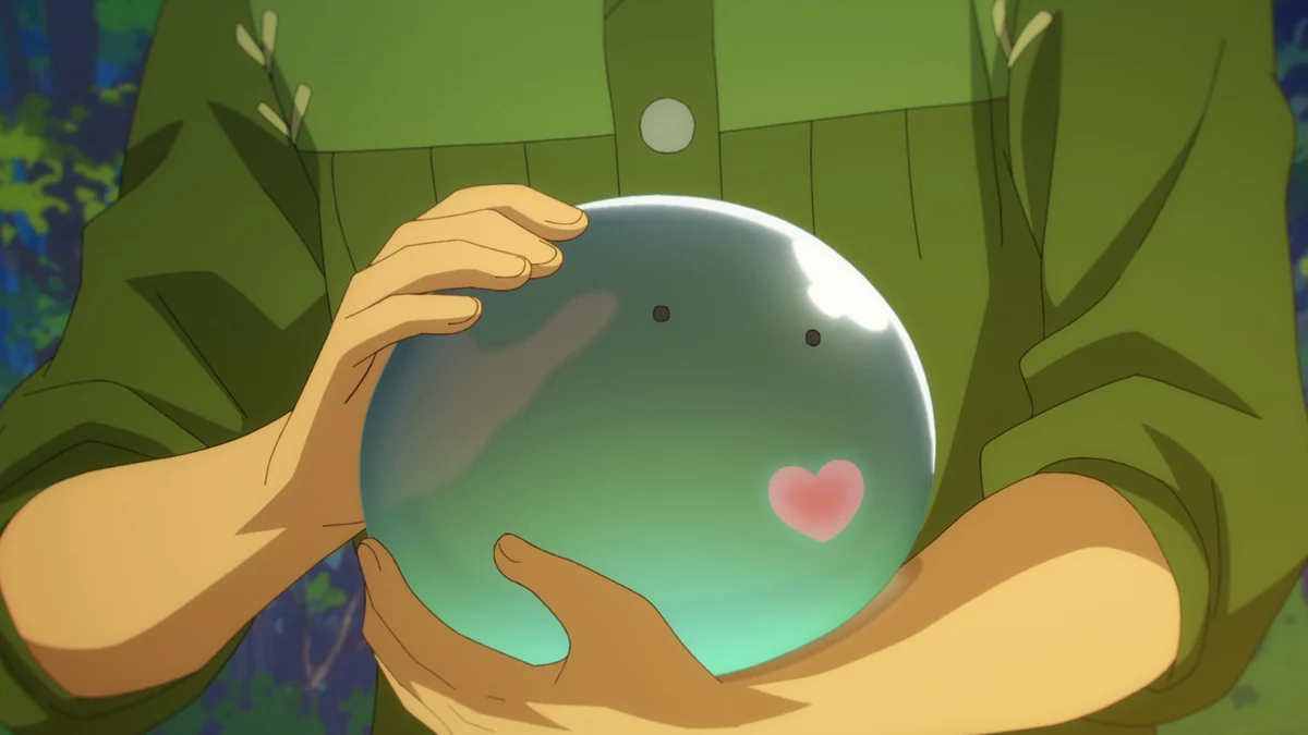 Mukohda cradles the translucent green slime Sui in his arms and gently pats its head.