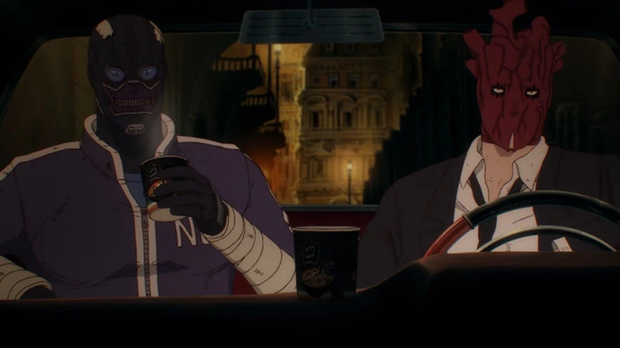 Noi, masked and holding a drink, sits beside Shin in his heart-shaped mask at the wheel of a car.