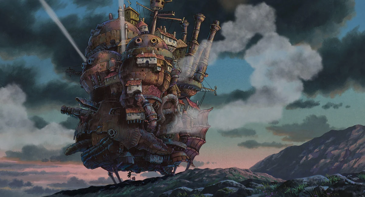 Howl's crowded walking castle stands against a cloudy sky.
