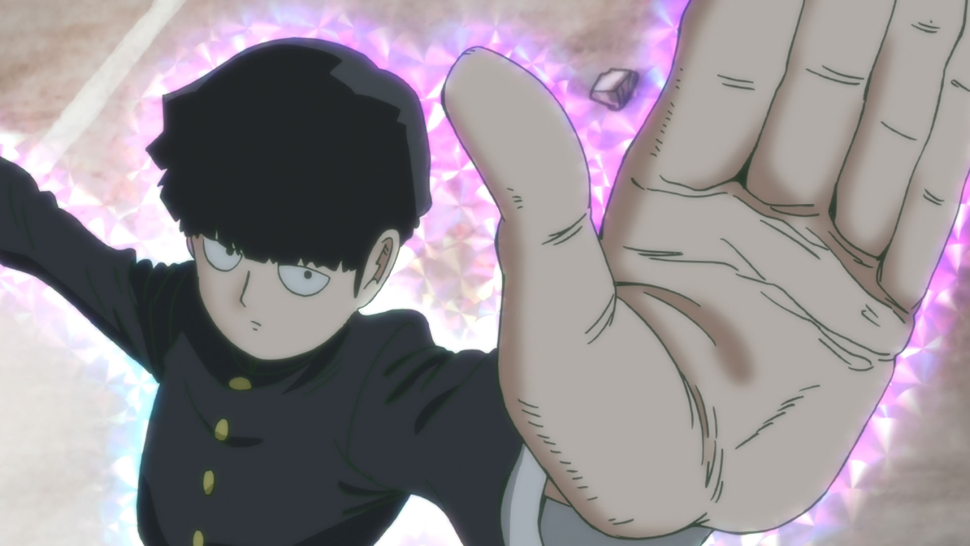 Mob uses his psychic powers, surrounded by a pink aura.
