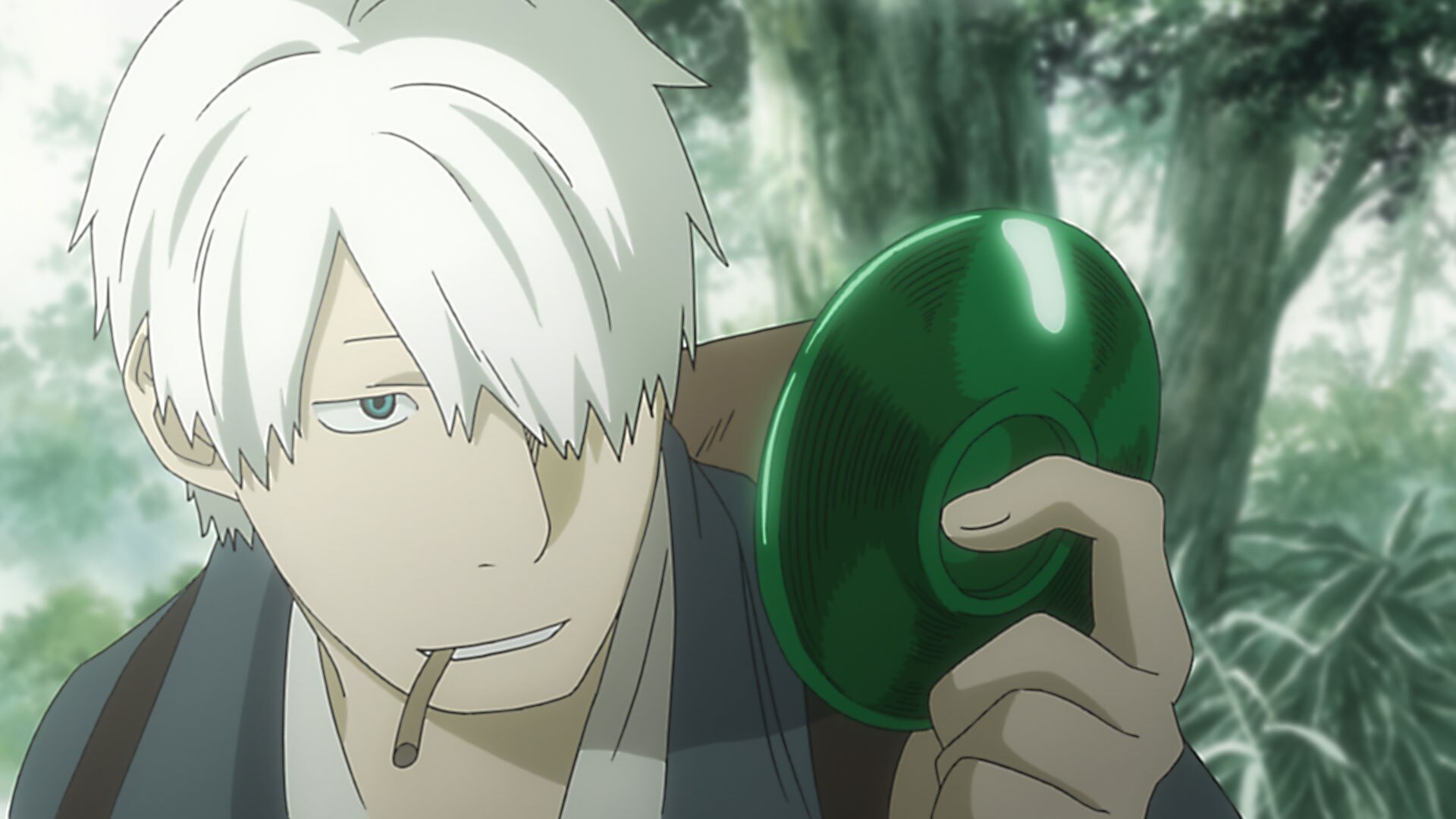 Ginko with white hair and a pipe, standing in woodland.