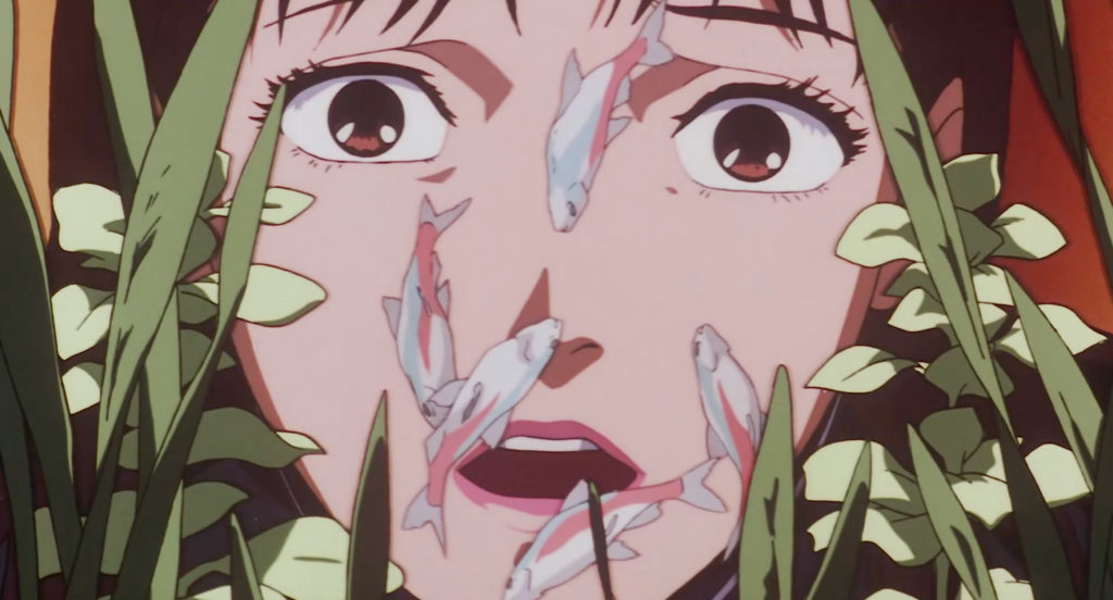 A woman's face appears behind aquarium glass, with pale fish and green plants layered across it.