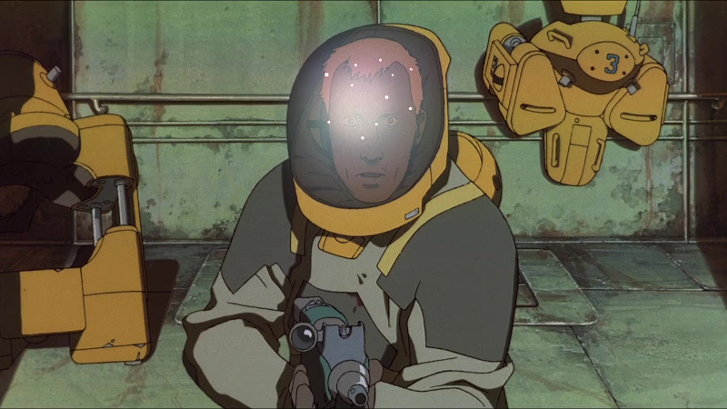 A space-suited explorer looks ahead through a lit visor, with other suited figures in the room behind him.
