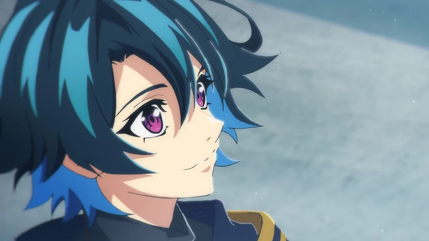 Will looks upwards with a small smile, his dark hair reflecting blue light.
