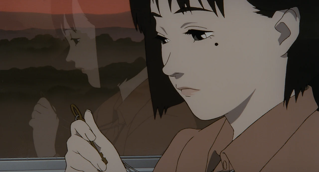 Young Chiyoko holds a small key beside a window reflecting her face and the landscape outside.